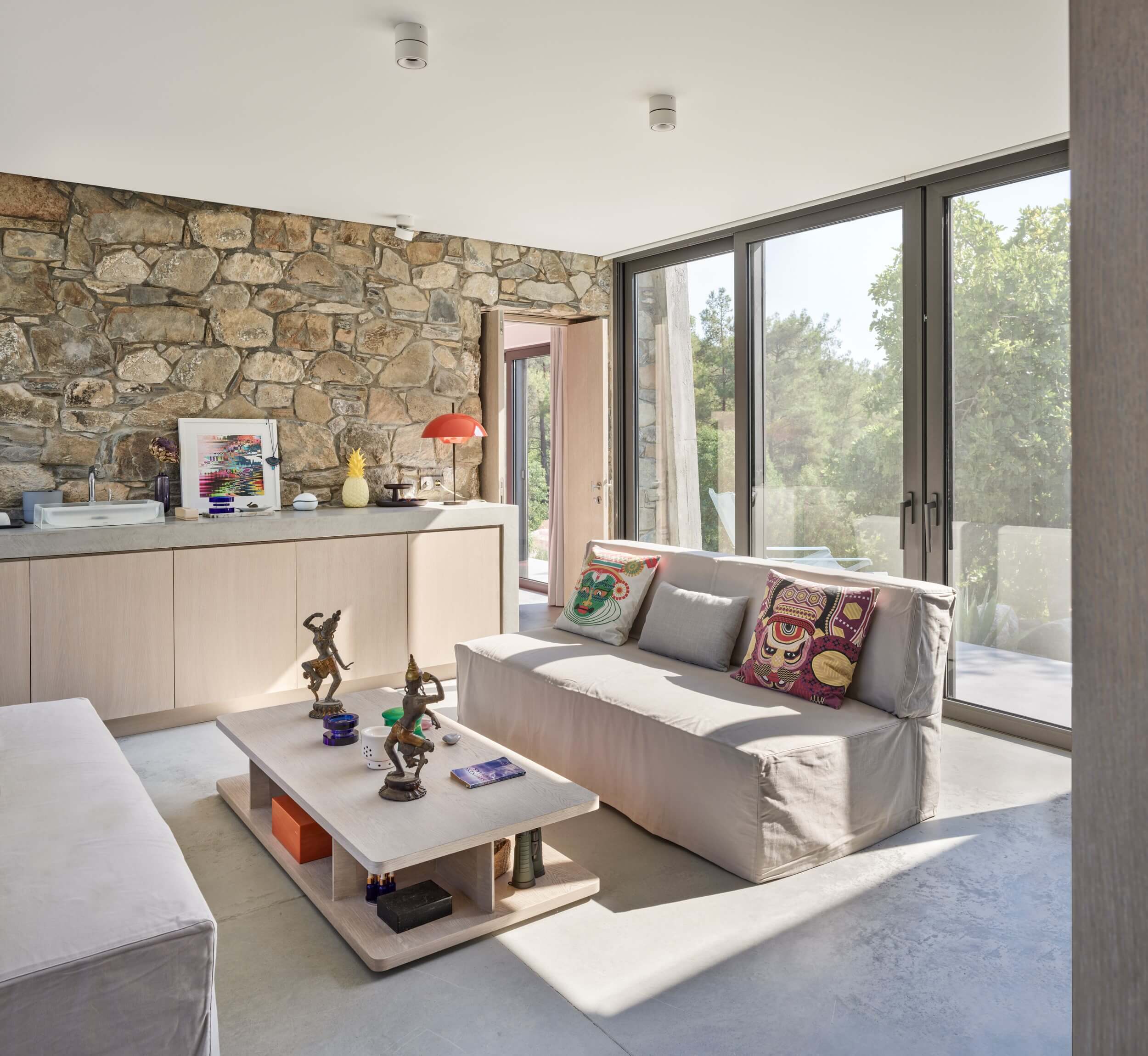 House with living room and aluminium sliding frames