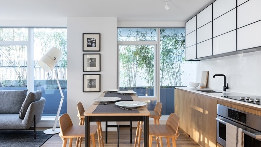 The kitchen is minimal and cozy
