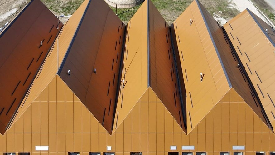The roof is shaped like a series of triangles