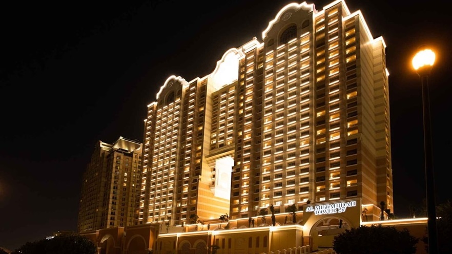 The building has many entries and balconies