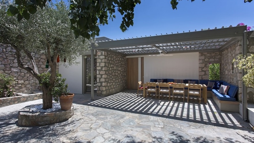 Outdoor sitting area under a pergola
