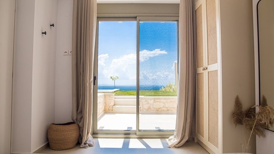 The terrace seen from inside the house through the window