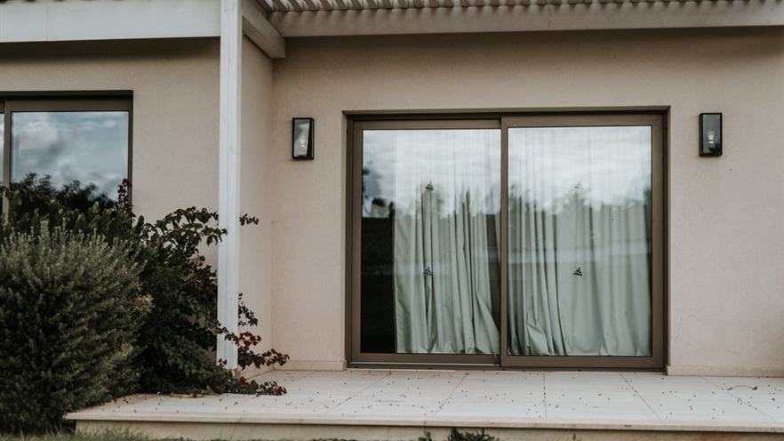 Closed aluminum window and outdoor terrace