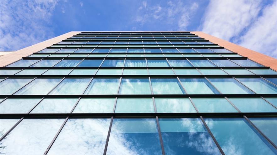 The glass façade viewed from the bottom to the top of the building