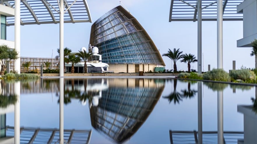 The Event Center's reflection on water