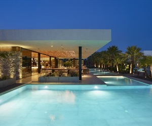 The pool with lights on at night