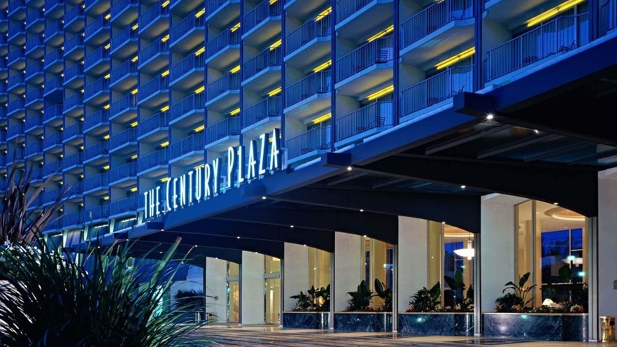 The hotel's entrance at night