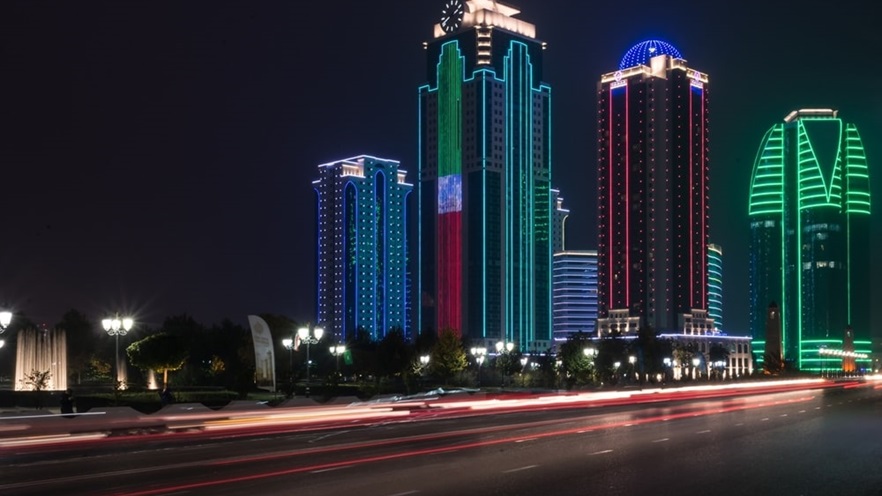 The buildings with lights on