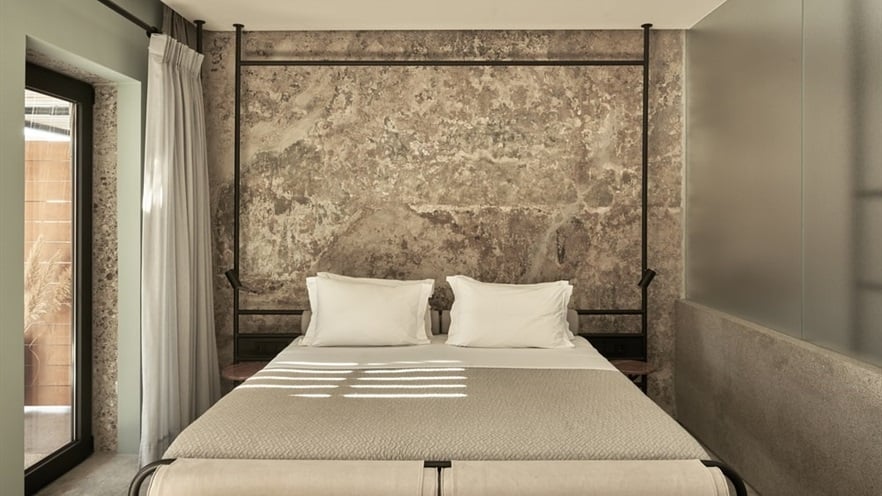 Twin bed next to the window