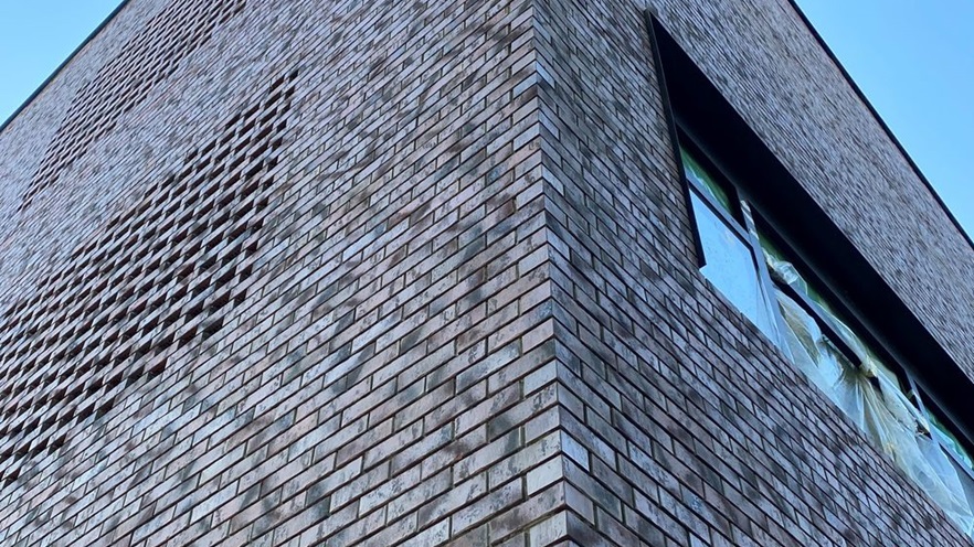 The school has brick walls on the outside