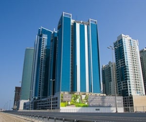 The large glass towers seen from the street