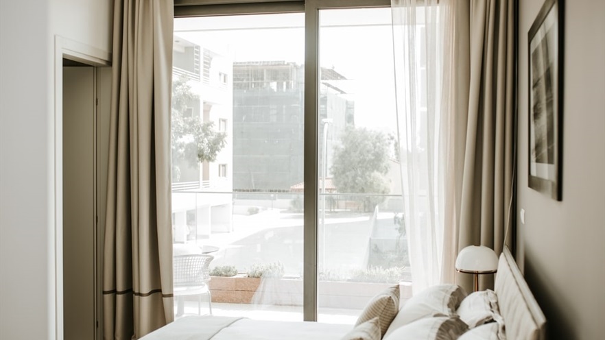 Bright bedroom with open curtains