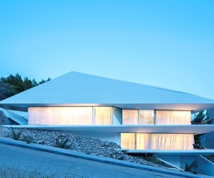 House from the outside with lights on