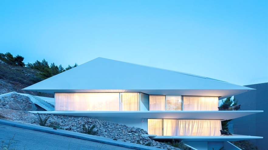 House from the outside with lights on