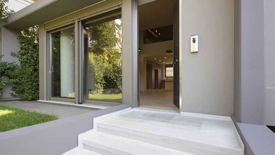 Stairs and an open entrance door