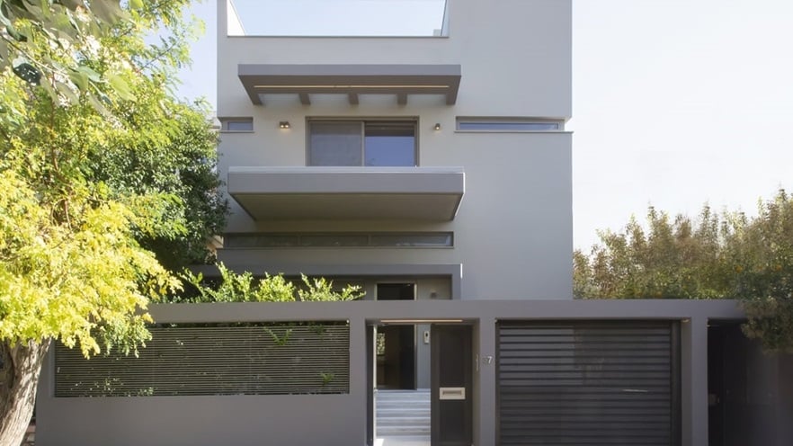 The two storey house as seen from the street