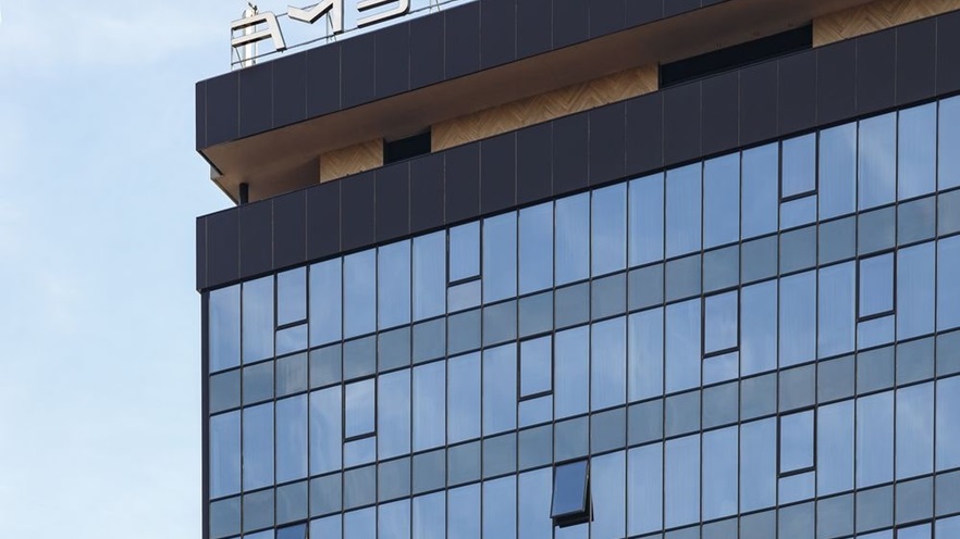 The building has a balcony at the top