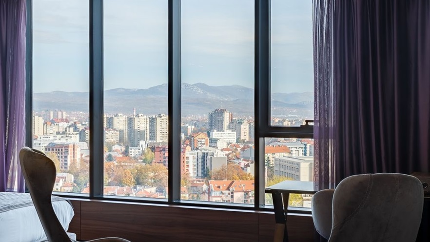 The rooms have a view to the city through the large openings