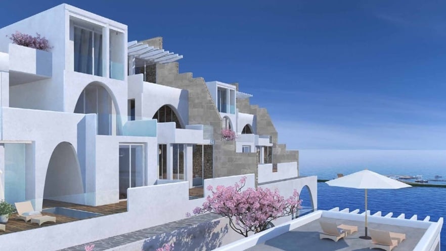 Panoramic sea view from Il Monte Galala Resort, featuring a terrace with glass railings, modern white building facades under a clear sky.