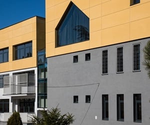 One balcony and windows of various sizes and shapes