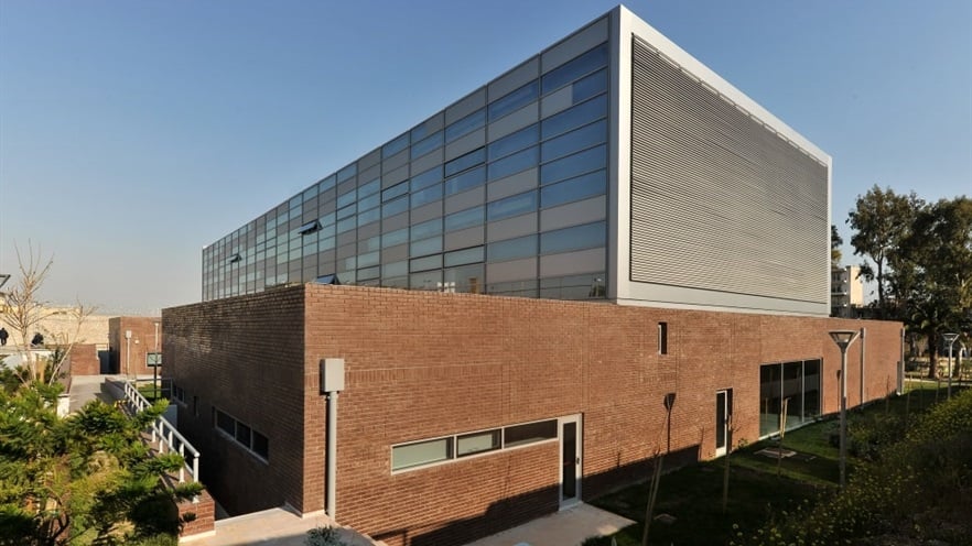 Brick wall and glass façade