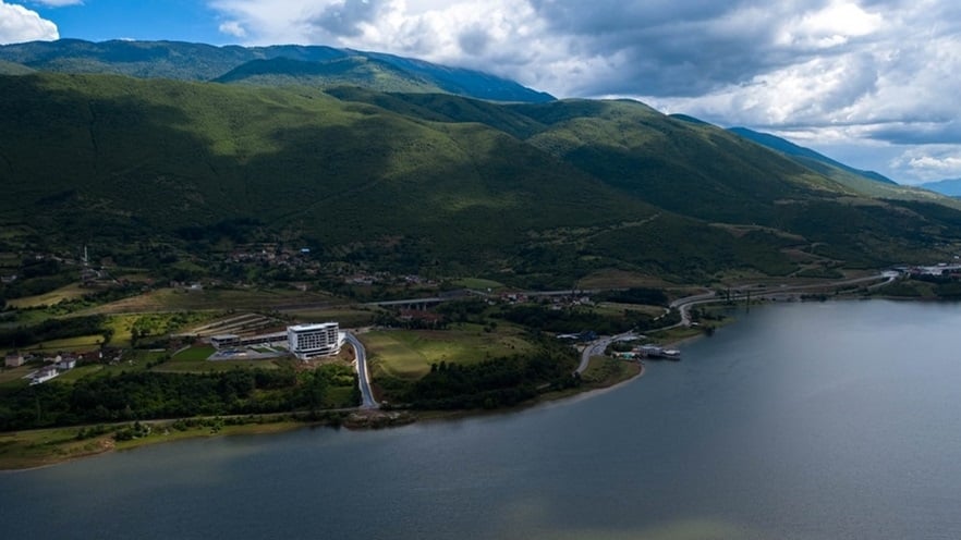 Aerial view of the lake, the nature and the hotel