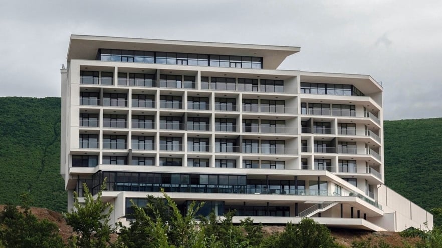 The multi-storey hotel has balconies at each room