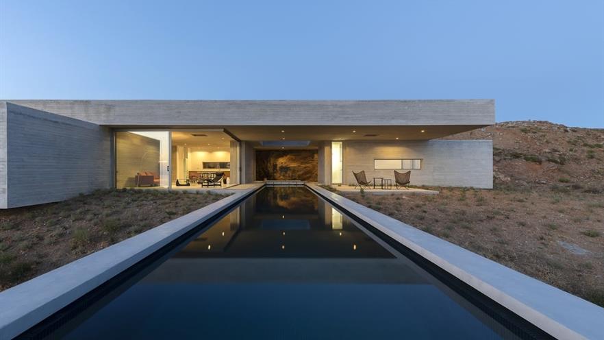 Close up to the house from the pool during the golden hour