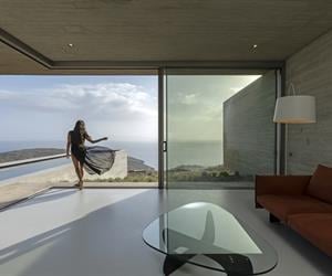Living room with girl dancing in front of the open window