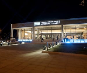 The front of the building at night