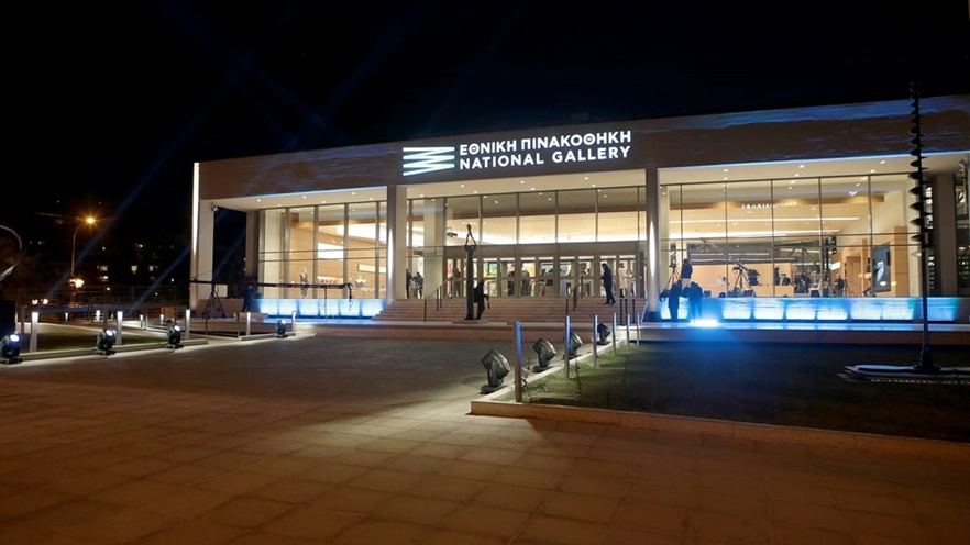 The front of the building at night