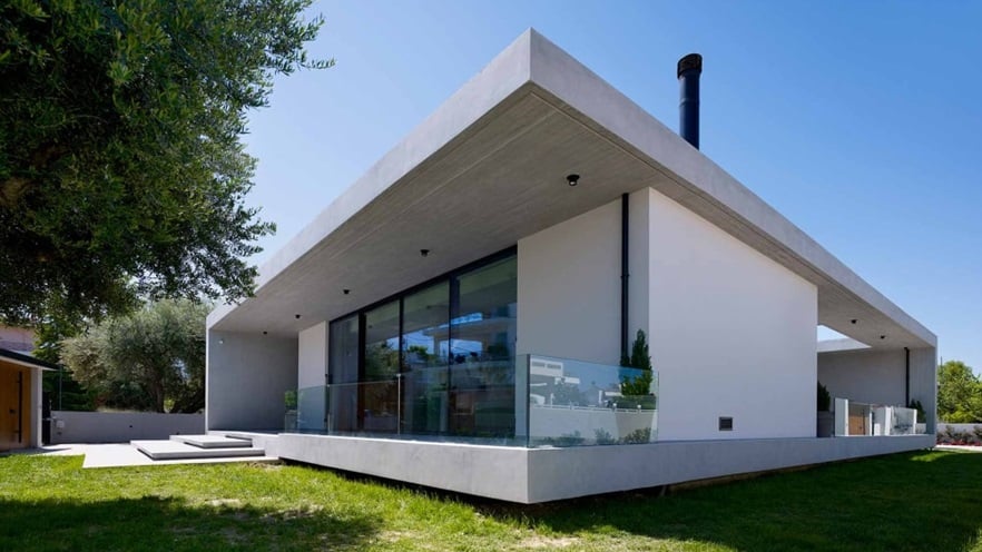 The house has terraces on two sides of it
