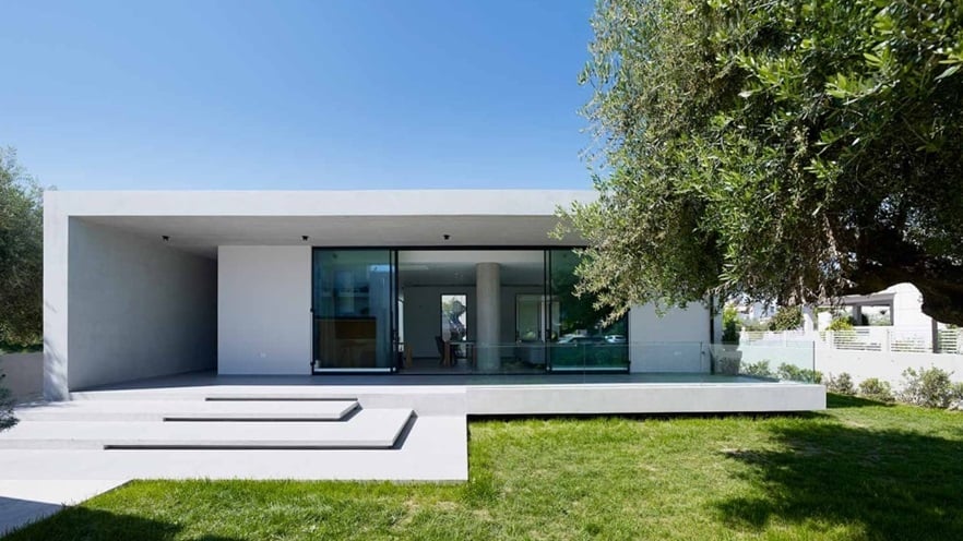 The front of the house with open windows