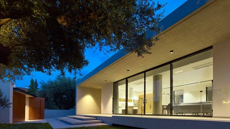 Large windows overlooking the terrace on the front of the house