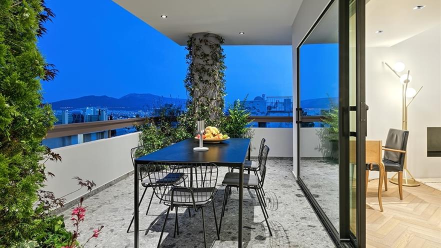 Balcony with table and plants