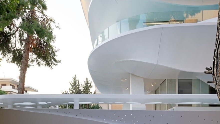 Curvy balcony with glass railings