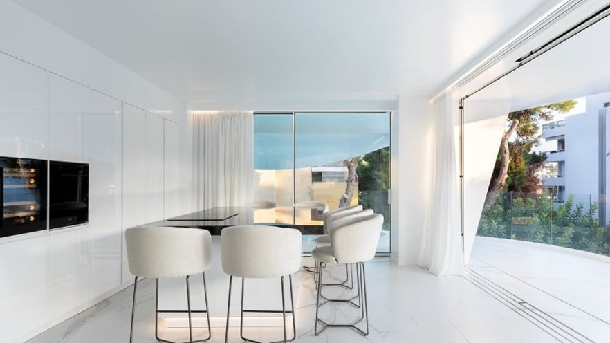 A big dining room with large windows