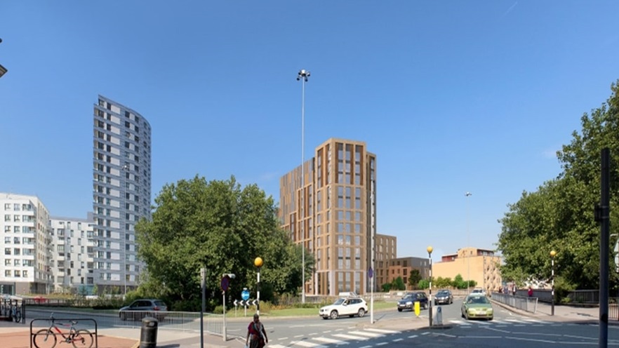 The building and the crossroad that leads to the quarter