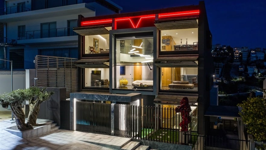 The house with lights on at night