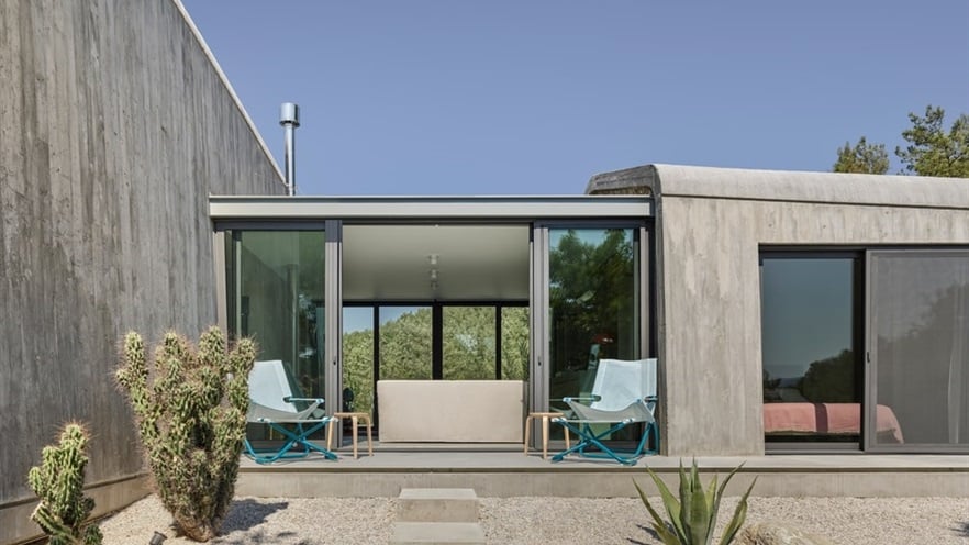 Terrace with chairs and cactuses