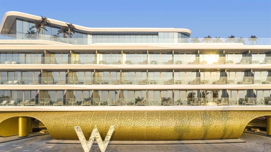 The large W sign in front of the building