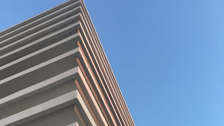 Close up to a corner of the building from below