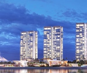 The towers with lights on at night