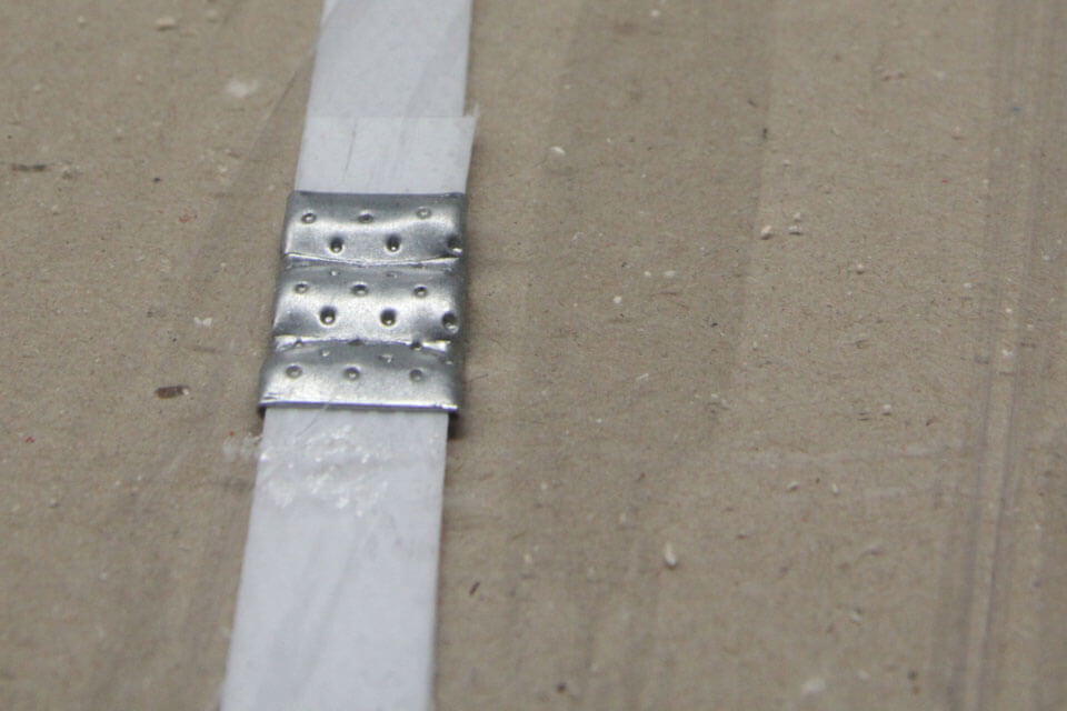 Plastic-strap-material