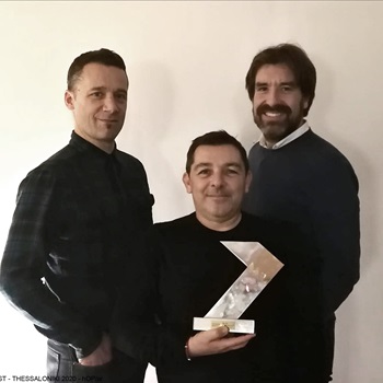 The architects holding their ArXellence 2 award